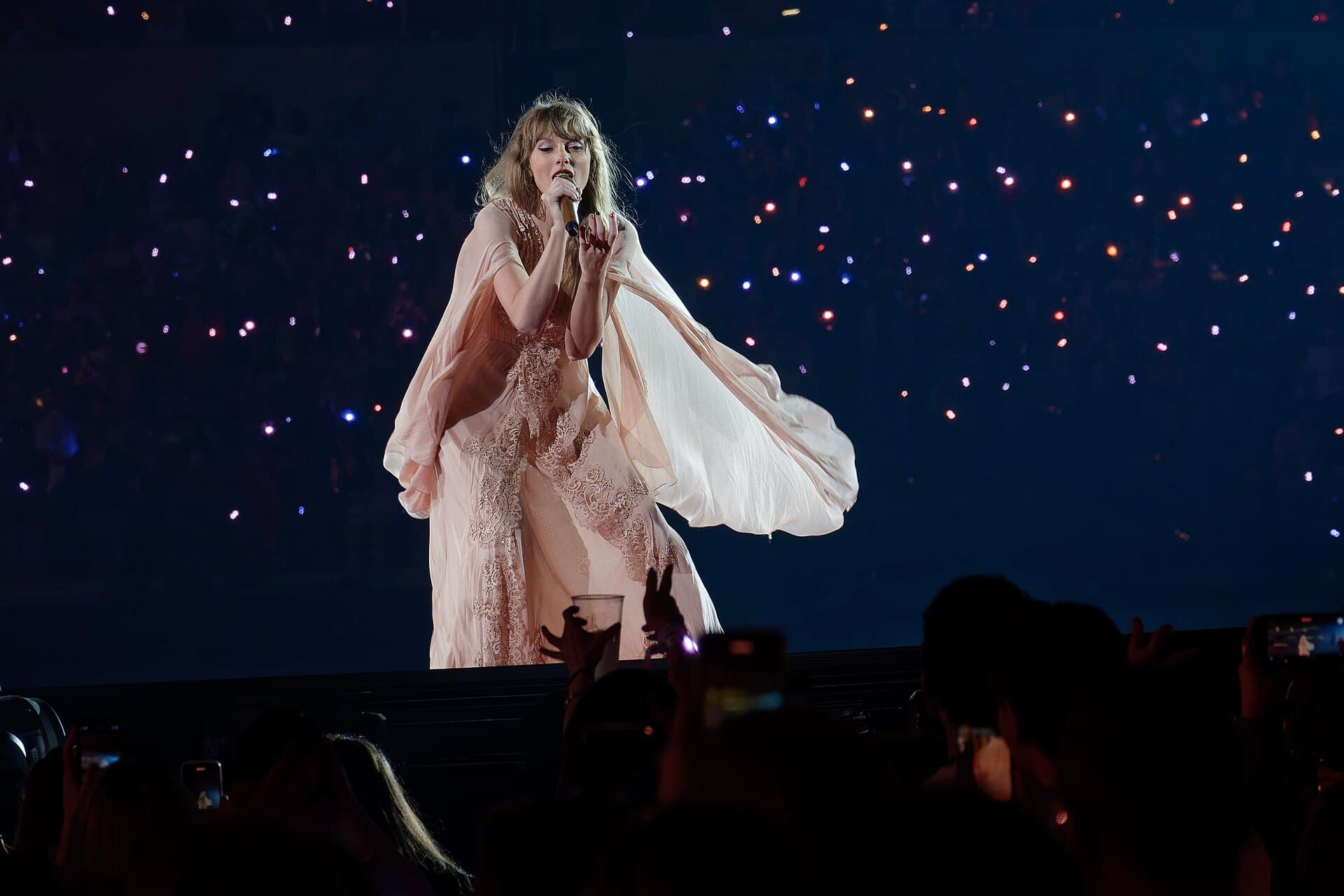 Taylor Swift performing on the Eras Tour in Arlington, Texas